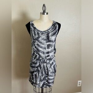 Super cute snakeskin print, form fitted cocktail style dress
